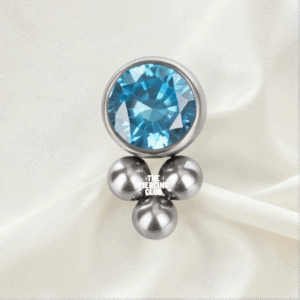 Joya triball con cristal aguamarina deluxe / Helix piercing, titanio grado implante