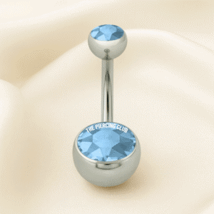 Joya con cristal azul / Navel (Ombligo) piercing , titanio grado implante
