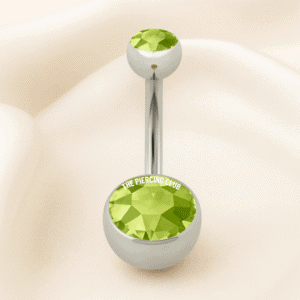 Joya con cristal verde / Navel (Ombligo) piercing , titanio grado implante