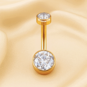 Joya dorada con cristal plano blanco deluxe / Navel (Ombligo) piercing , titanio grado implante